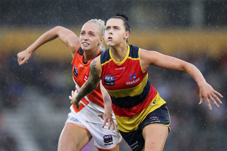 AFLW 2018 Rd 04 - GWS Giants v Adelaide Crows SYDNEY, AUSTRALIA - FEBRUARY 25: Rhiannon Metcalfe of the Crows competes for the ball against Philippa Smyth of the Giants during the round four AFLW match between the Greater Western Sydney Giants and the Adelaide Crows at Blacktown International Sportspark on February 25, 2018 in Sydney, Australia. (Photo by Matt King/Getty Images/AFL Media)
